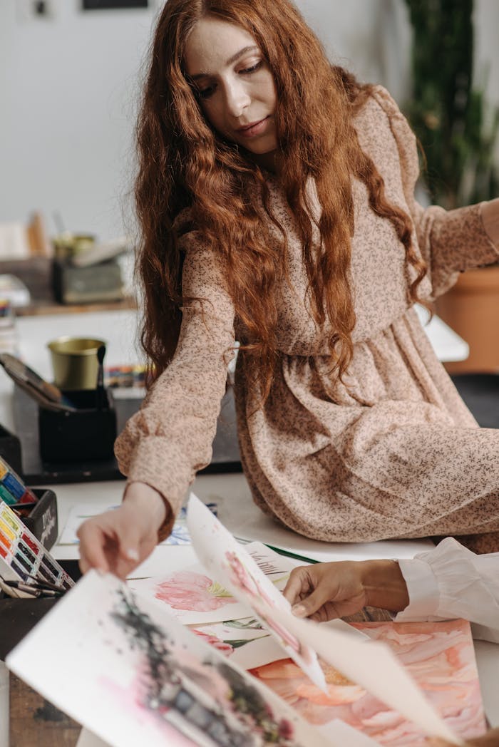 Woman engaged in drawing lessons in a cozy art studio, exploring her creativity.